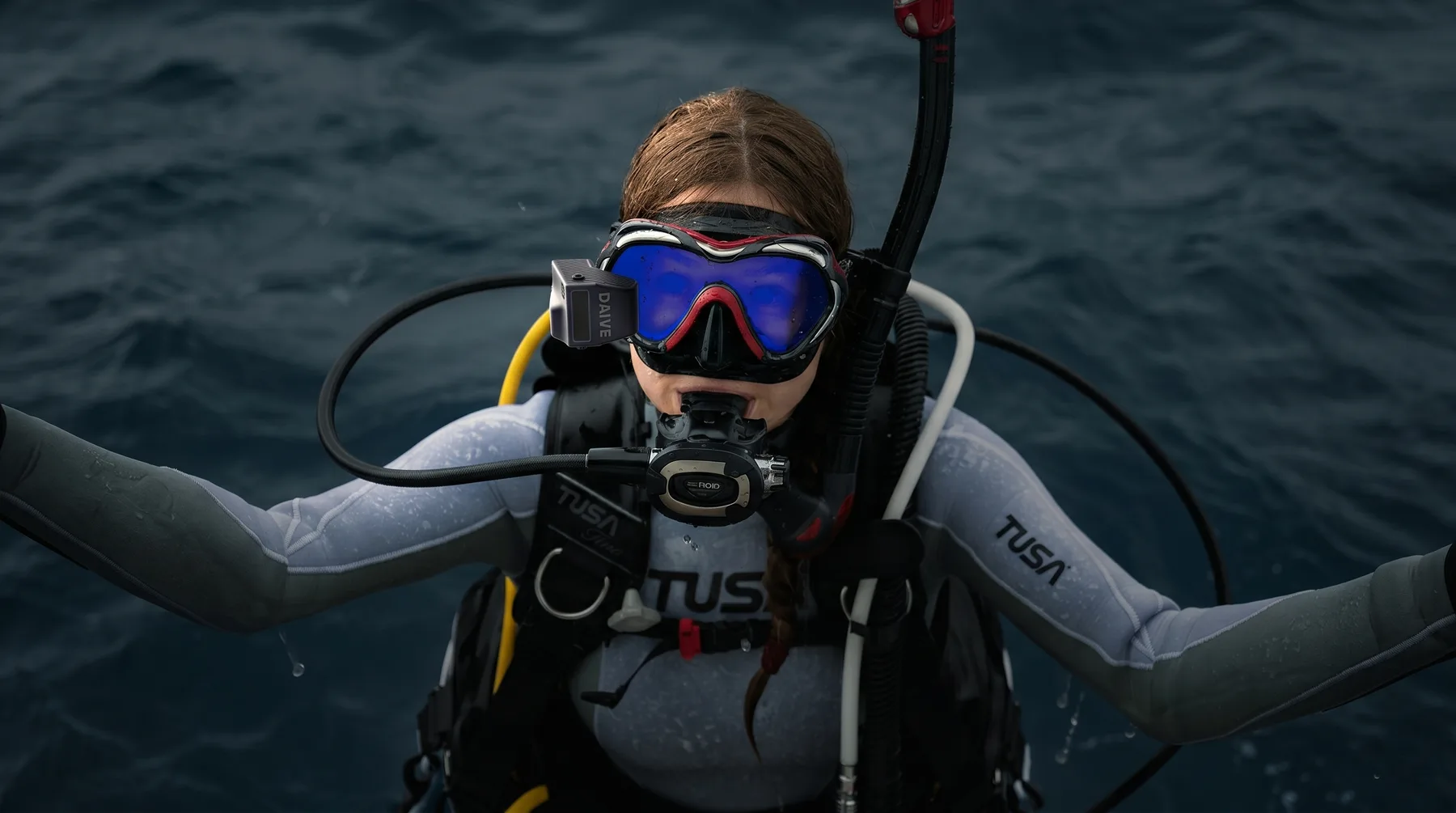 Field-test diver at the surface wearing DAÏVE HUD